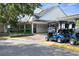 View of golf cart storage and bag drop area at 3404 Rexford Cir, Ormond Beach, FL 32174
