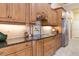 Kitchen boasts light wood cabinets, granite counters, and stainless steel appliances at 3404 Rexford Cir, Ormond Beach, FL 32174