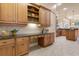Bright kitchen with built-in desk and lots of cabinet storage at 3404 Rexford Cir, Ormond Beach, FL 32174