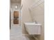 Laundry room with utility sink and access to pantry at 3404 Rexford Cir, Ormond Beach, FL 32174