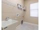 Laundry room with utility sink and ample shelving at 3404 Rexford Cir, Ormond Beach, FL 32174