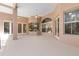 Spacious patio with access to the kitchen and backyard at 3404 Rexford Cir, Ormond Beach, FL 32174