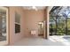 Screened patio with pool access and outdoor sink at 3404 Rexford Cir, Ormond Beach, FL 32174