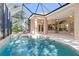 Large screened pool with spa and access from patio at 3404 Rexford Cir, Ormond Beach, FL 32174
