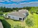 Aerial view showcasing the home's backyard and surrounding landscape at 708 Aldenham Ln, Ormond Beach, FL 32174