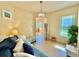 Cozy den with daybed, offering extra sleeping space and natural light at 708 Aldenham Ln, Ormond Beach, FL 32174
