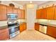 Modern kitchen with stainless steel appliances and ample cabinetry at 708 Aldenham Ln, Ormond Beach, FL 32174