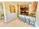 Kitchen features granite countertops and wood cabinets at 708 Aldenham Ln, Ormond Beach, FL 32174