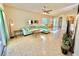 Bright and airy living room with a comfortable sectional sofa at 708 Aldenham Ln, Ormond Beach, FL 32174