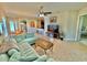 Bright and airy living room with a comfortable seating area and open floor plan at 708 Aldenham Ln, Ormond Beach, FL 32174