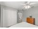 Bedroom with large closet and ceiling fan at 1732 Creekwater Blvd, Port Orange, FL 32128