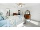 Bedroom with carpeted floors and antique wooden dresser at 2181 Glenwood Hammock Rd, Deland, FL 32720