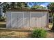 Large storage shed with double doors in the backyard at 2181 Glenwood Hammock Rd, Deland, FL 32720