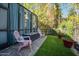 Landscaped backyard with seating area and privacy at 660 Aldenham Ln, Ormond Beach, FL 32174