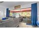 Gathering room with sliding glass doors leading to a lanai and pool at 660 Aldenham Ln, Ormond Beach, FL 32174