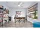 Spacious home office with built-in shelving and window at 660 Aldenham Ln, Ormond Beach, FL 32174