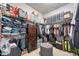 Large walk-in closet with ample shelving and hanging space at 660 Aldenham Ln, Ormond Beach, FL 32174