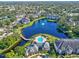 Luxury community with lake, pool, and lush landscaping at 940 Village Trail # 7-107, Port Orange, FL 32127
