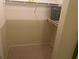 Spacious closet with wire shelving for ample storage at 940 Village Trail # 7-107, Port Orange, FL 32127