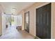 Shared hallway with access to the unit and outdoor area at 940 Village Trail # 7-107, Port Orange, FL 32127