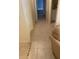 Clean hallway with tile floors connecting rooms at 940 Village Trail # 7-107, Port Orange, FL 32127