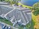 Building roof and surrounding landscape at 940 Village Trail # 7-107, Port Orange, FL 32127