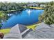 Condo roof with lake view in the background at 940 Village Trail # 7-107, Port Orange, FL 32127