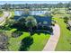 Luxury home with a large backyard, pool, and golf course views at 501 Oyster Bay Dr, Ormond Beach, FL 32174