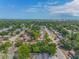 Aerial view showing home's location in a residential neighborhood at 747 Derbyshire Rd, Daytona Beach, FL 32114