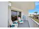 Relaxing balcony with ocean views, furnished with Adirondack chairs at 1183 Ocean Shore Blvd # 1040, Ormond Beach, FL 32176