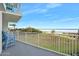 Balcony overlooking grassy area and beach with a calming ocean view at 1183 Ocean Shore Blvd # 1040, Ormond Beach, FL 32176