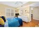 Relaxing bedroom with natural light and a peek into another room at 1183 Ocean Shore Blvd # 1040, Ormond Beach, FL 32176