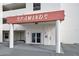 Seawinds Condo entrance with double doors, awning, and convenient access at 1183 Ocean Shore Blvd # 1040, Ormond Beach, FL 32176