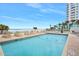 Inviting community pool overlooking the ocean at 1183 Ocean Shore Blvd # 1040, Ormond Beach, FL 32176