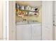 Convenient laundry room with stacked washer and dryer at 1183 Ocean Shore Blvd # 1040, Ormond Beach, FL 32176
