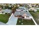 Aerial view of a single-Gathering home with a fenced yard and driveway at 21 Sunset Blvd, Ormond Beach, FL 32176