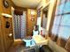 Rustic bathroom with unique decor, a shower, and a sink at 21 Sunset Blvd, Ormond Beach, FL 32176