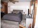 Bedroom featuring a gray upholstered bed, nightstands, and a dresser at 21 Sunset Blvd, Ormond Beach, FL 32176