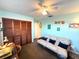 Simple bedroom or office with a futon couch and closet at 21 Sunset Blvd, Ormond Beach, FL 32176
