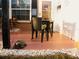 Welcoming front porch with seating area, potted plants, and decorative tortoise at 21 Sunset Blvd, Ormond Beach, FL 32176