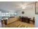 Dining area with wood table and chairs, near living room at 2294 Ocean Shore Blvd # 1020, Ormond Beach, FL 32176