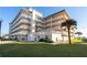 Multi-story building, ocean view, palm trees at 2294 Ocean Shore Blvd # 1020, Ormond Beach, FL 32176