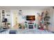 Living room with Christmas decorations and an entertainment center at 2727 N Atlantic Ave # 203, Daytona Beach, FL 32118