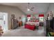 Spacious main bedroom with vaulted ceiling, ceiling fan, and ensuite bathroom at 3 Marsh Ridge Watch, Ormond Beach, FL 32174