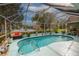 Screened-in pool with views of the lake at 3 Marsh Ridge Watch, Ormond Beach, FL 32174