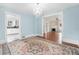 Dining room with hardwood floors, chandelier, and view into adjacent rooms at 318 Vermont Ave, Daytona Beach, FL 32118
