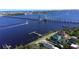 Sailboat passing under the bridge in an aerial view at 546 Rio Vista Ave, Daytona Beach, FL 32114