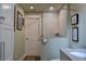 Modern bathroom featuring a walk-in shower, single vanity, and light green walls at 546 Rio Vista Ave, Daytona Beach, FL 32114