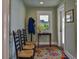 Welcoming entryway with seating, a small table, and decorative rug at 546 Rio Vista Ave, Daytona Beach, FL 32114