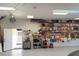 Organized garage with storage shelves, tools, and equipment at 546 Rio Vista Ave, Daytona Beach, FL 32114